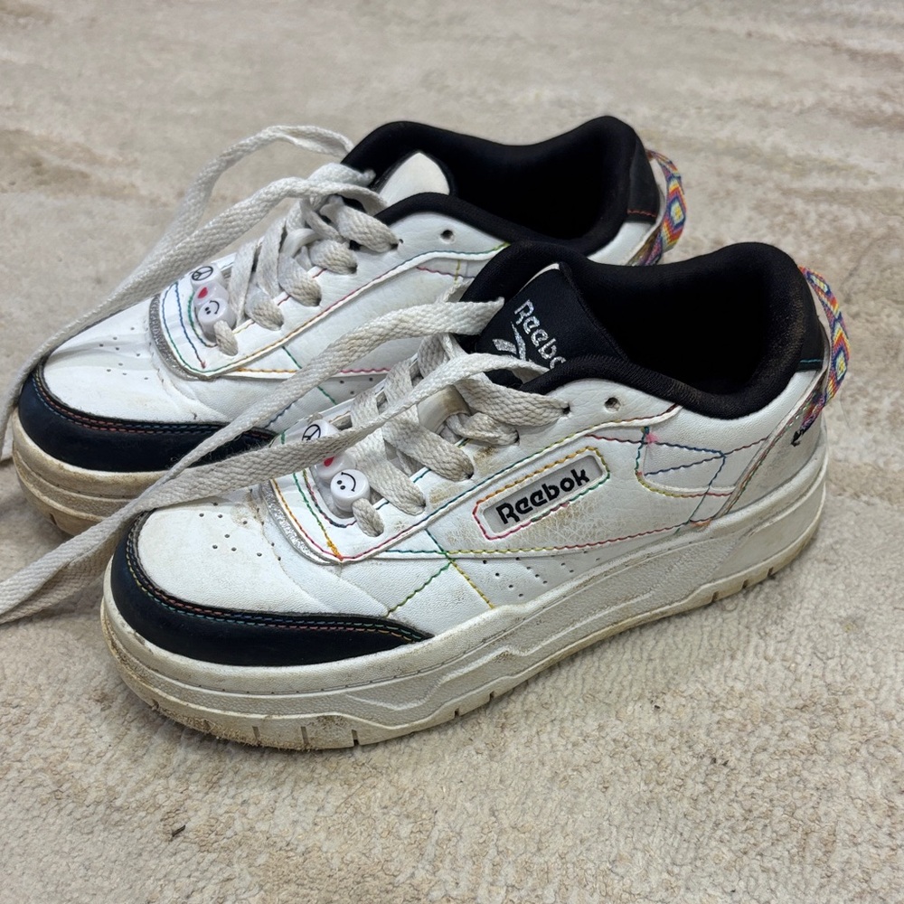 Reebok Kids White Leather Sneakers with Black Trim and Rainbow Stitching